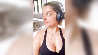 Bebe Rexha revealing deep soft cleavage for us