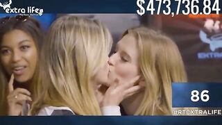 Barbara Dunkelman and Ashley Jenkins sharing a kiss