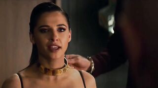 Naomi Scott collared