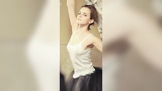 : Emma Watson braless in a white tank top #2