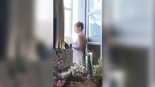 Taylor Russell [Lost In Space] flashing at her hotel window in Paris
